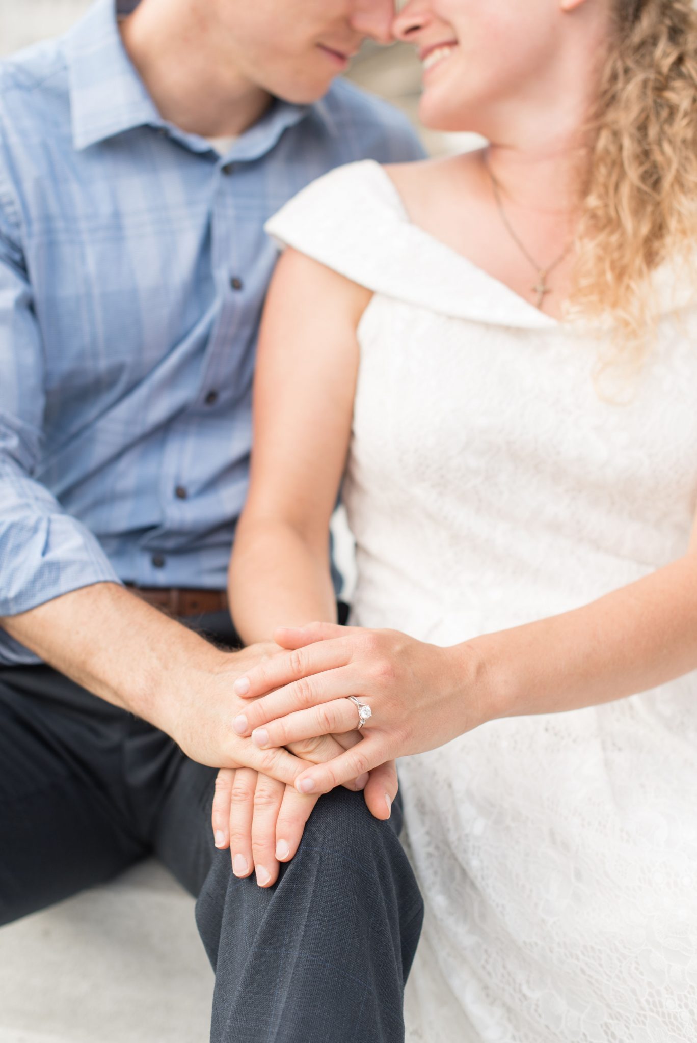 Detail of couple holding hands with engagement ring by Indianapolis wedding photographer Victoria Rayburn Photography