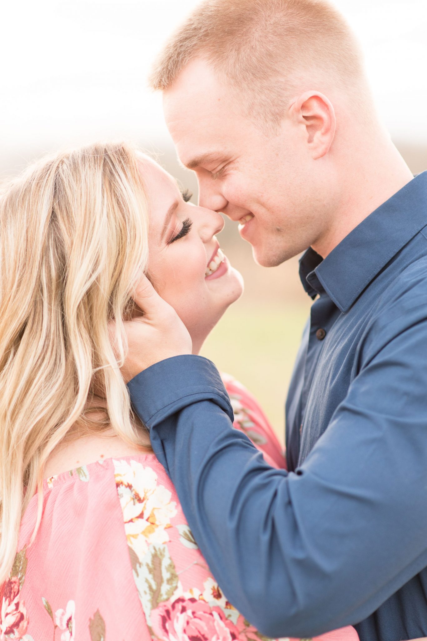Couple get close during engagement photos by Indianapolis wedding photographer Victoria Rayburn Photography