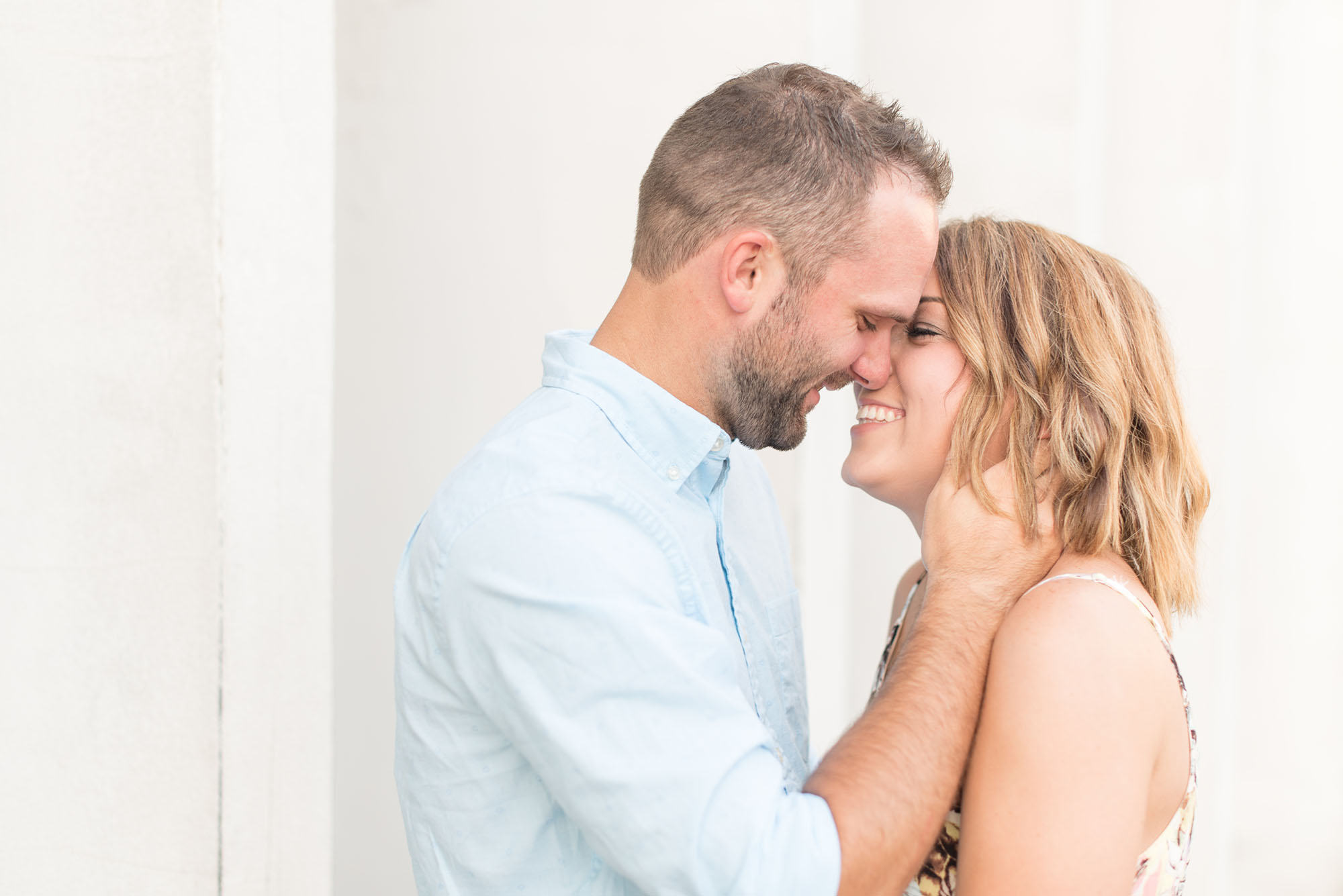 Couple laugh during engagement photos by Indianapolis wedding photographer Victoria Rayburn Photography