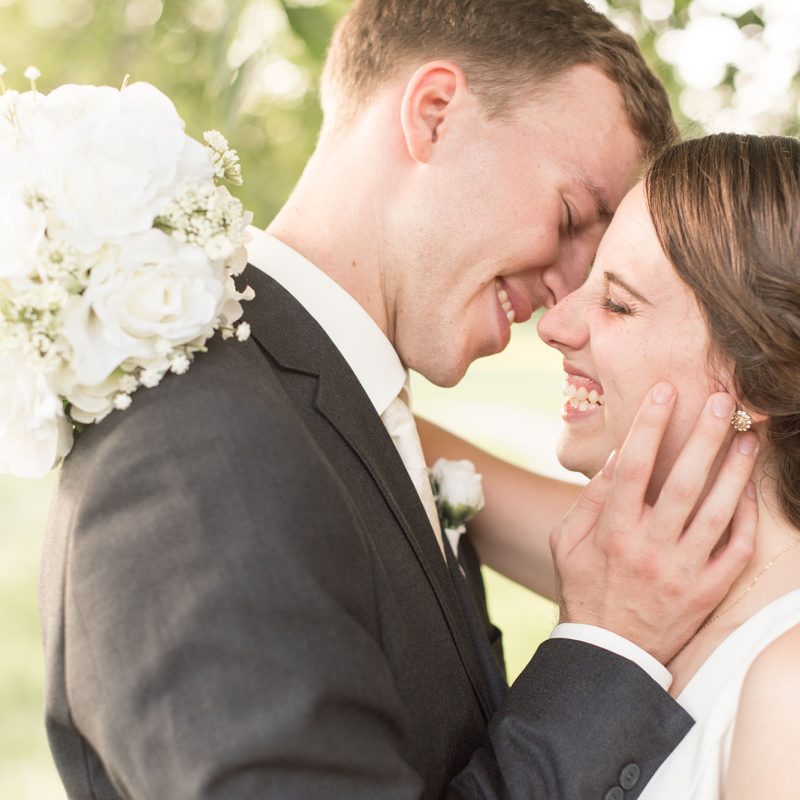 Bride and groom laugh during wedding photos by Indianapolis wedding photographer Victoria Rayburn Photography