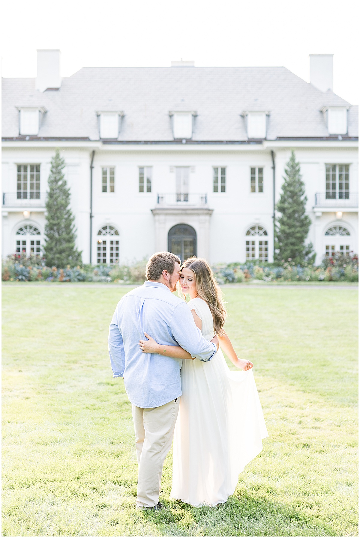 Couple in front of house on Newfields by Indianapolis wedding photographer Victoria Rayburn Photography