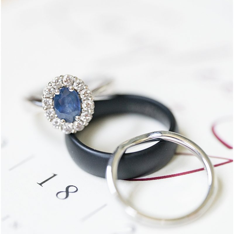 Close up of wedding rings with blue stone by Indianapolis wedding photographer Victoria Rayburn Photography