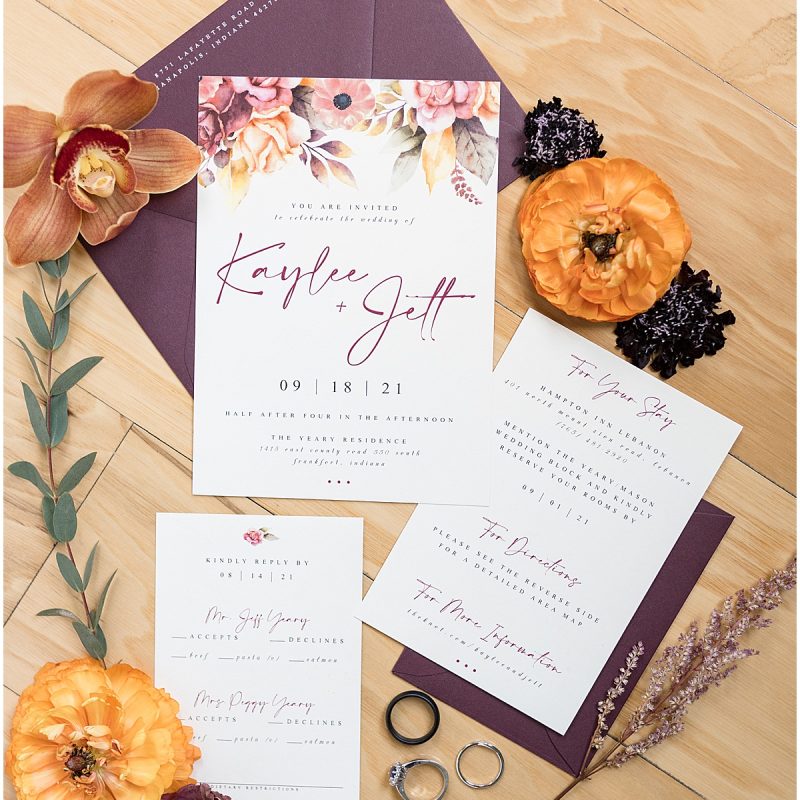 Invitation and bridal details featuring purple and orange by Indianapolis wedding photographer Victoria Rayburn Photography