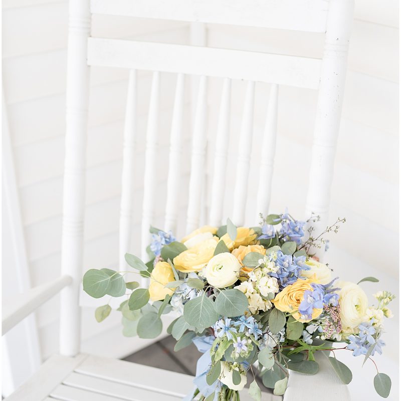 Bridal bouquet on rocking chair by Indianapolis wedding photographer Victoria Rayburn Photography