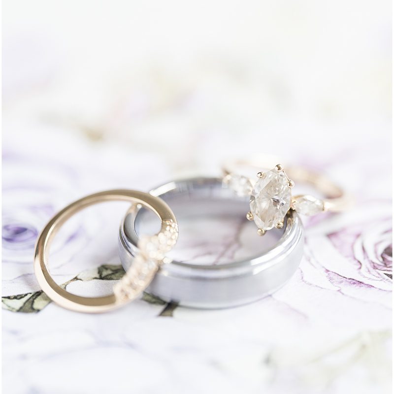 Gold and silver wedding rings close up by Indianapolis wedding photographer Victoria Rayburn Photography