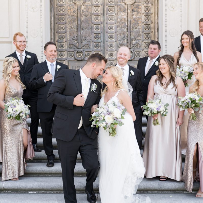 Bridal party walking down stairs during photos by Indianapolis wedding photographer Victoria Rayburn Photography