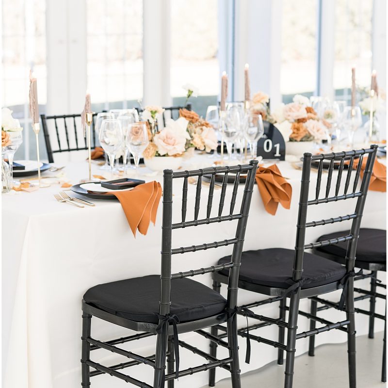 Black and orange table setting for Ritz Charles Reception by Indianapolis wedding photographer Victoria Rayburn Photography