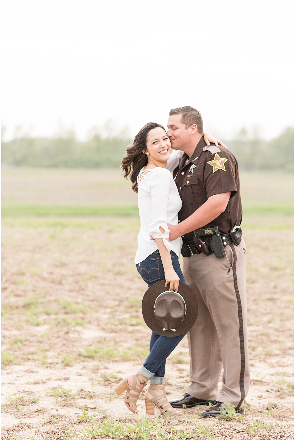 Jesse Wallace and Miryam Herrera's spring engagement photos at Wea Creek Orchard by Victoria Rayburn Photography
