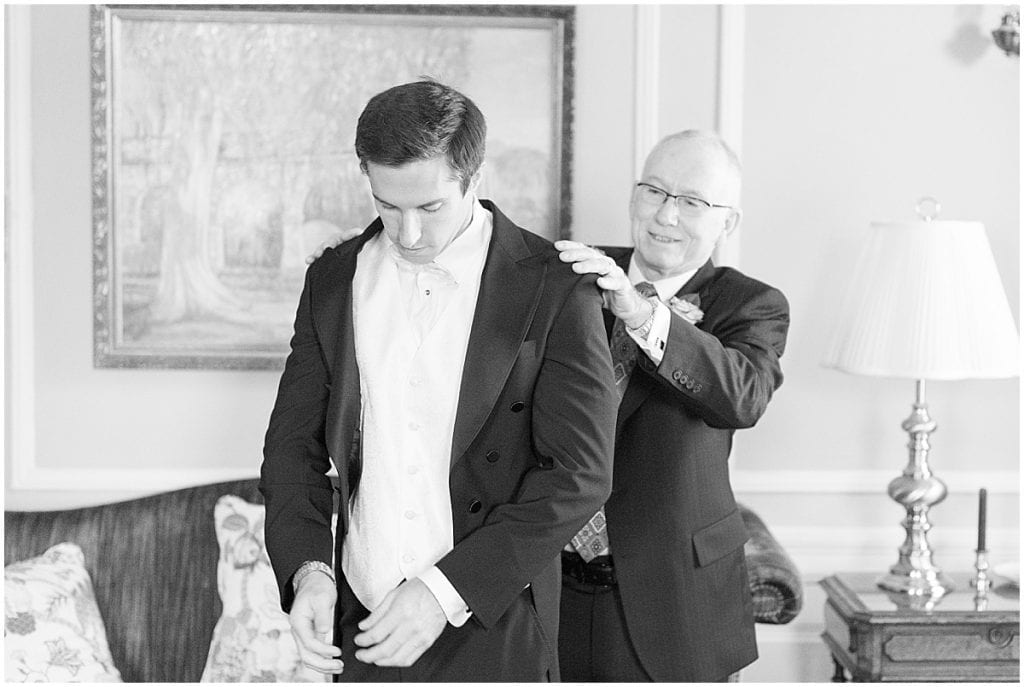 Groom getting ready for wedding at Duncan Hall in Lafayette, Indiana