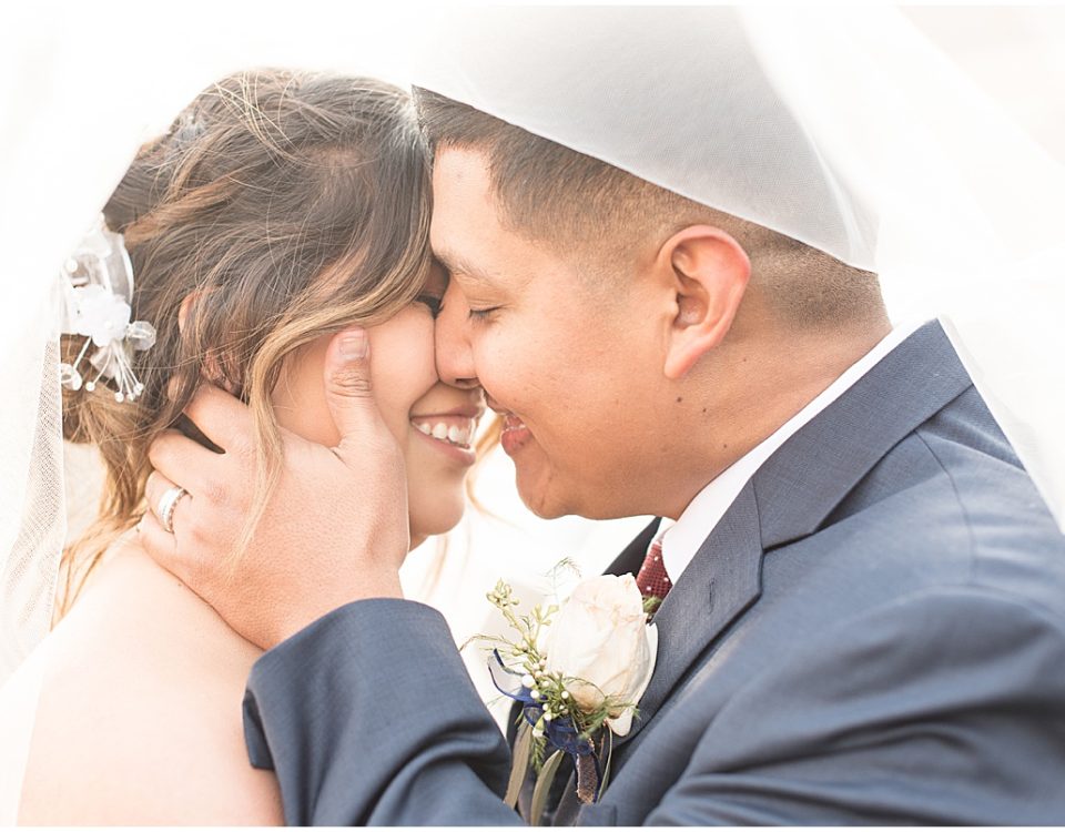 Bride and groom at wedding at St. Mary's Catholic Church in Frankfort, Indiana