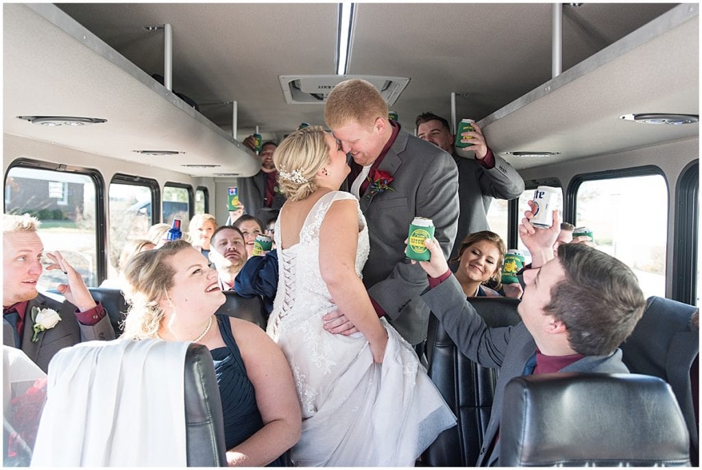 Bridal party on bus headed to ceremony