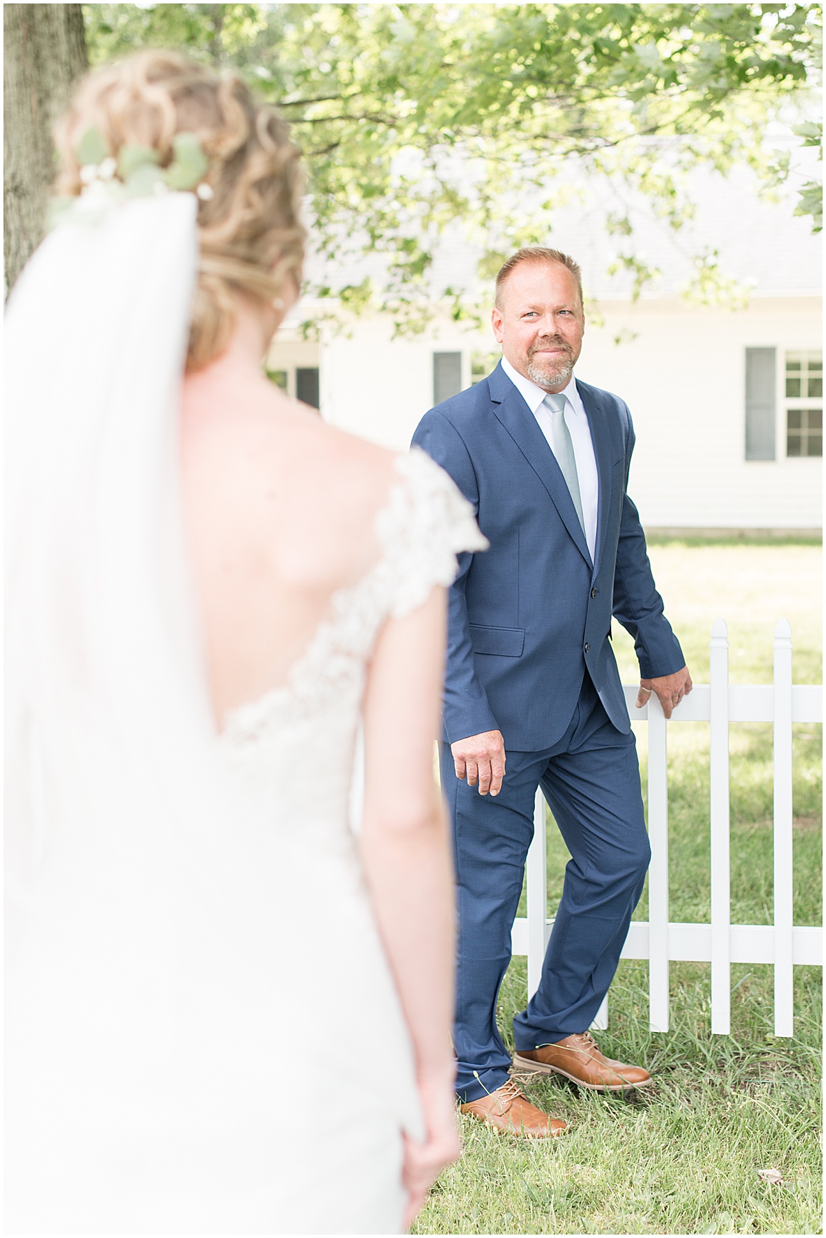 Bride's first look with her dad before wedding at The Matterhorn in Elkhart, Indiana