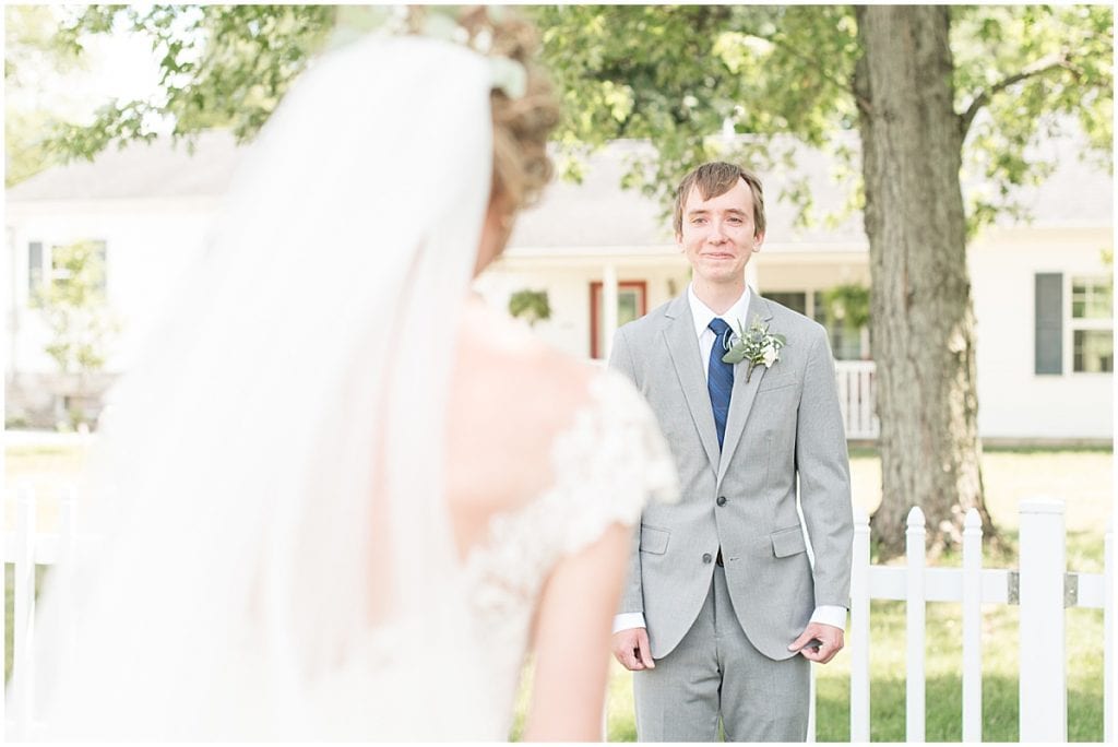 Bride and groom's first look before wedding at The Matterhorn in Elkhart, Indiana