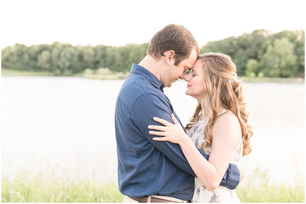 Couple embracing during Lakefront engagement photos in Lafayette, Indiana