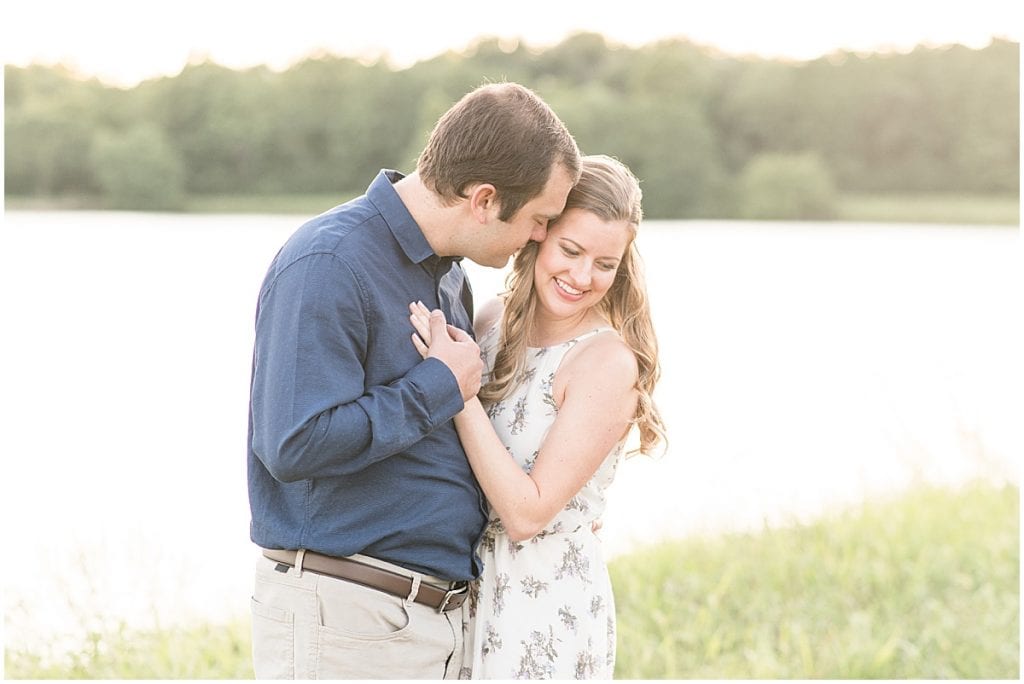 Couple holding each other in Lakefront engagement photos in Lafayette, Indiana