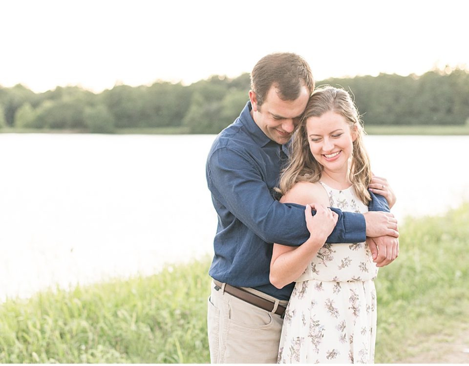 Engaged couple hugging in Lakefront engagement photos in Lafayette, Indiana