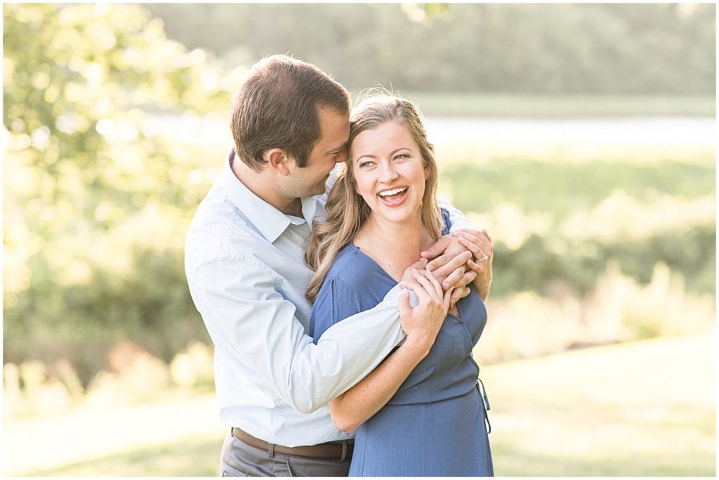 Couple embracing during Lakefront engagement photos in Lafayette, Indiana
