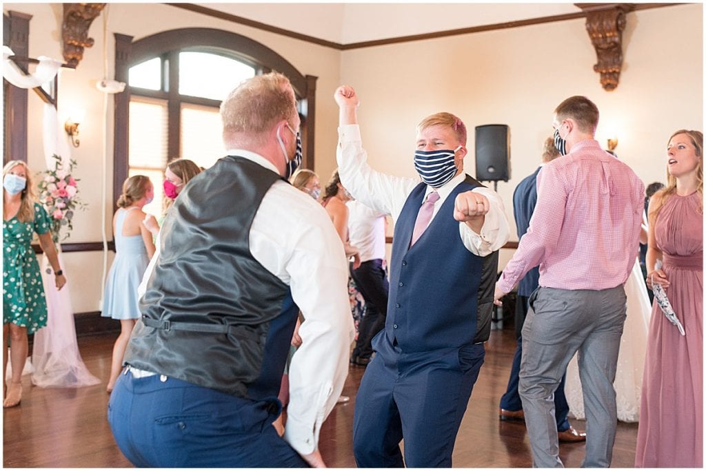 Dancing in masks at Spohn Ballroom wedding in Goshen, Indiana