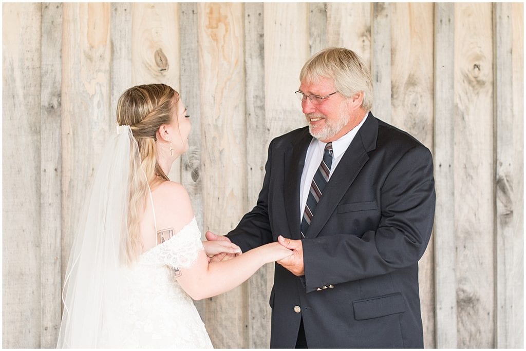 Bride's first look with her dad before wedding at Whippoorwill Hill in Bloomington, Indiana