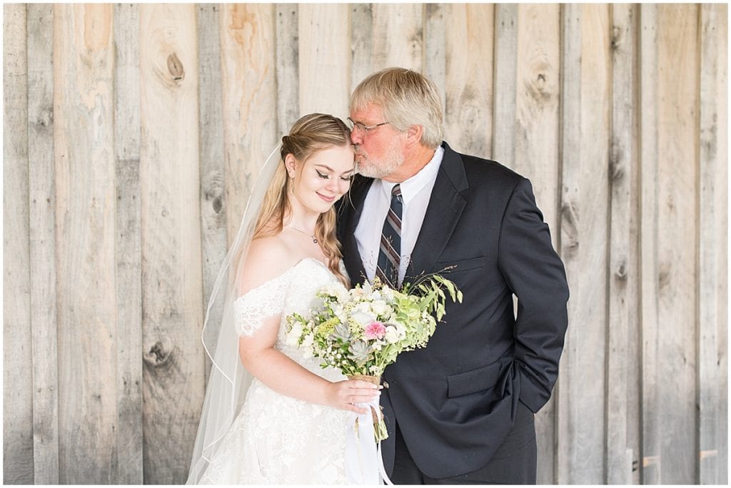 Bride's first look with her dad before wedding at Whippoorwill Hill in Bloomington, Indiana