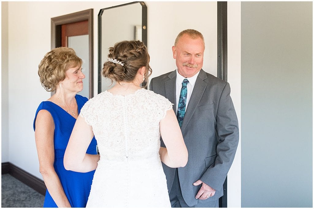 First look with Father of the bride in intimate wedding at Holliday Park in Indianapolis