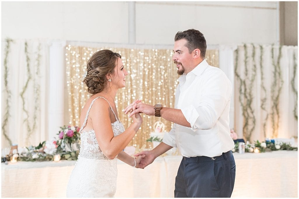 Bride and groom dancing during reception in Rensselaer, Indiana at the Jasper County fairgrounds