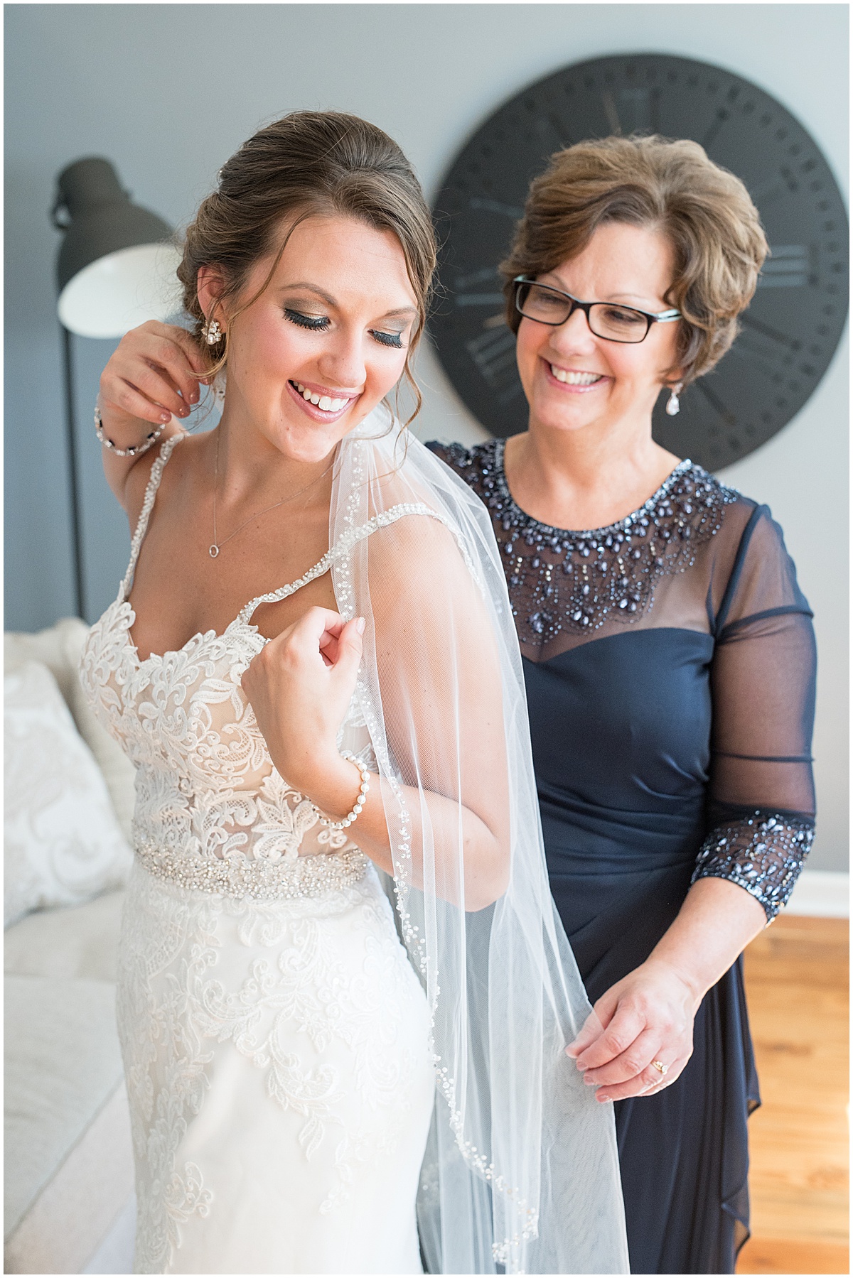 Mother of the bride helps bride get ready for Rensselaer, Indiana wedding