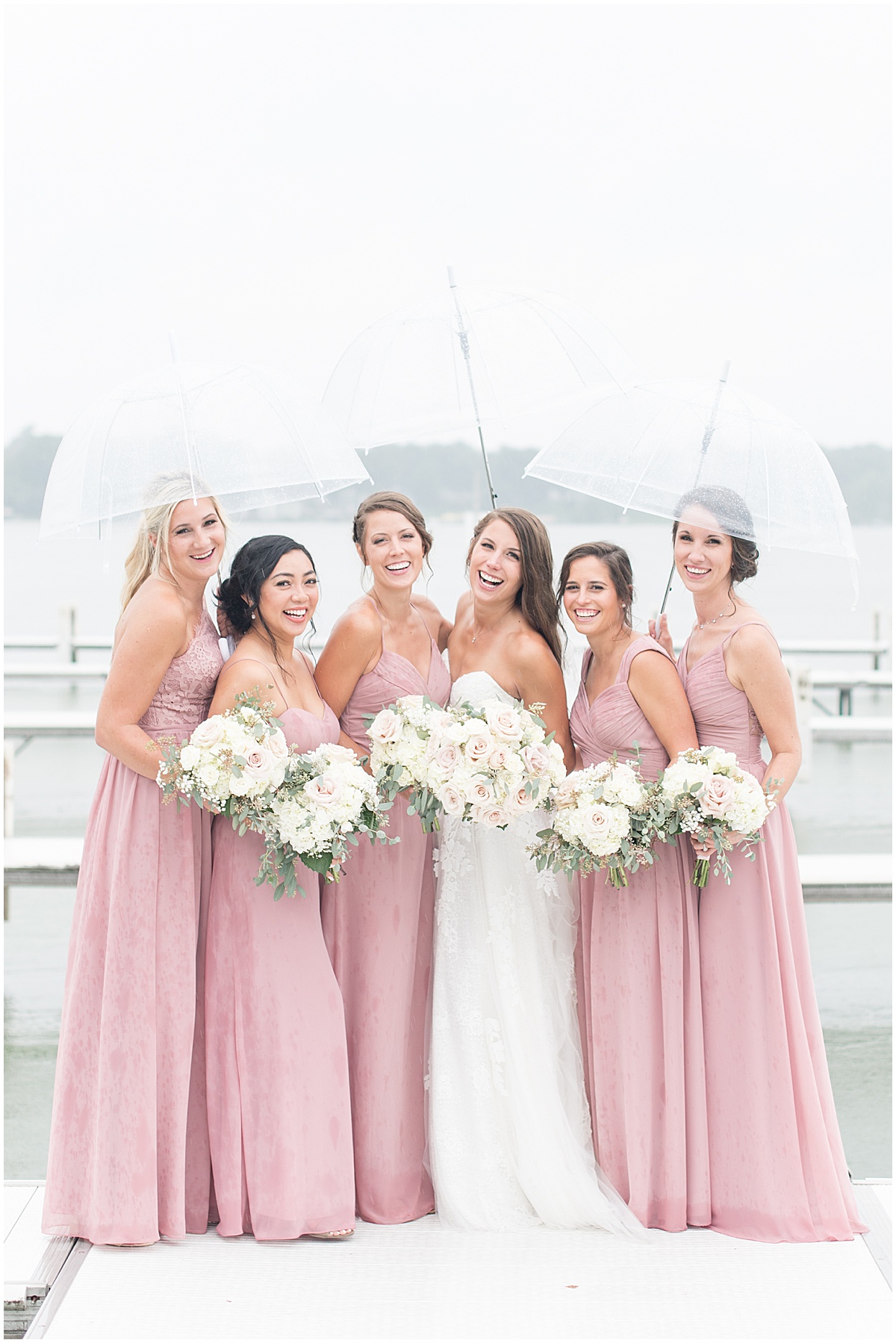Bridal party photos on pier outside of the Lighthouse Restaurant in Cedar Lake, Indiana