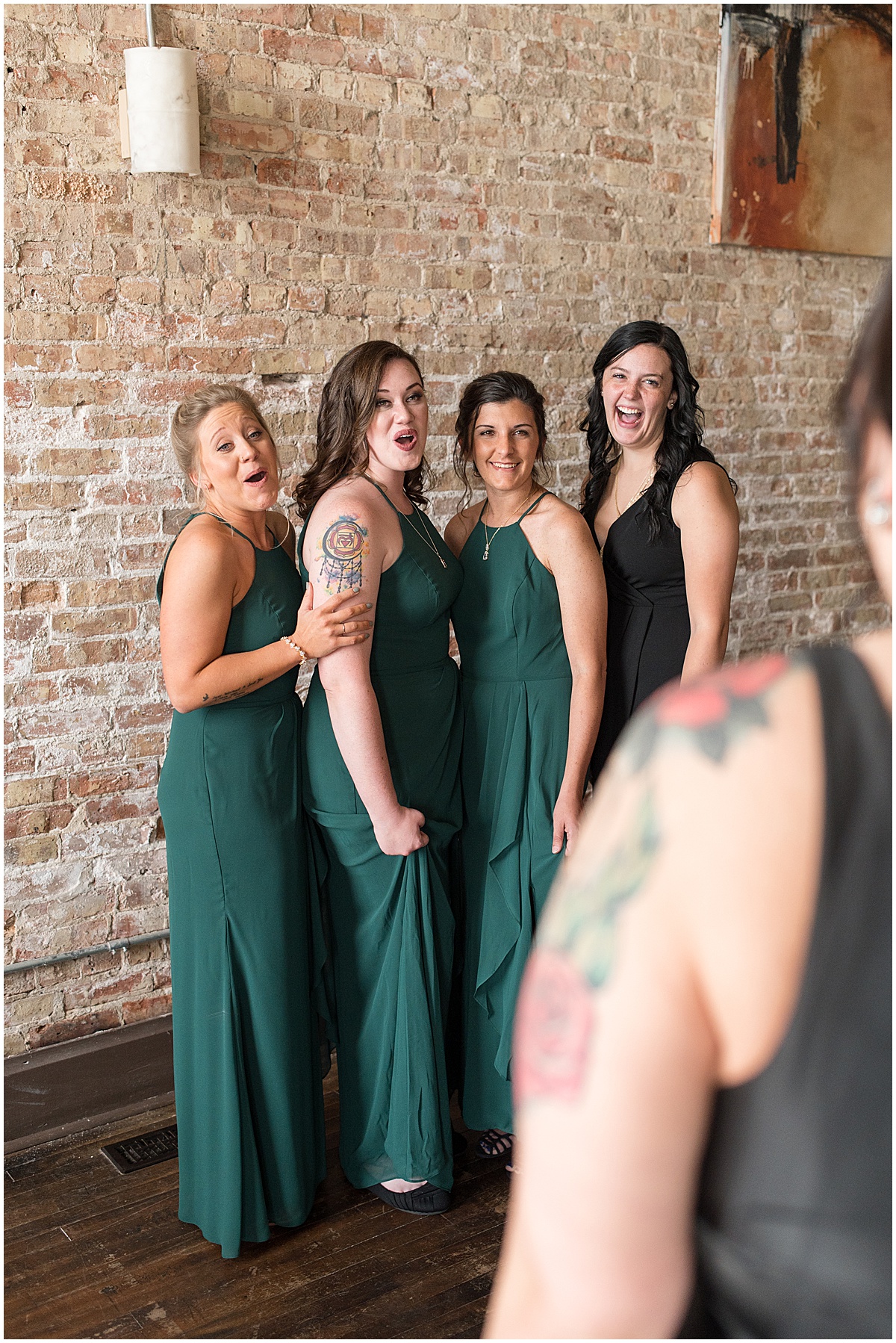 Bridesmaids first look before eMbers Venue wedding in Rensselaer, Indiana