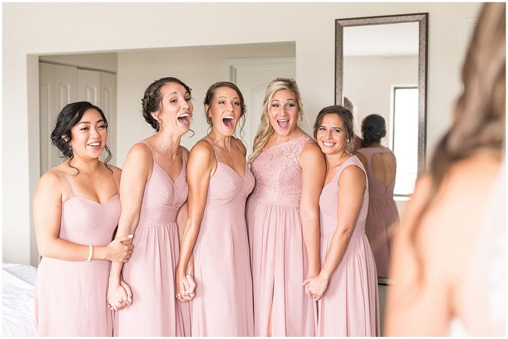 Bridesmaids reaction at wedding at The Lighthouse Restaurant in Cedar Lake, Indiana by Victoria Rayburn Photography