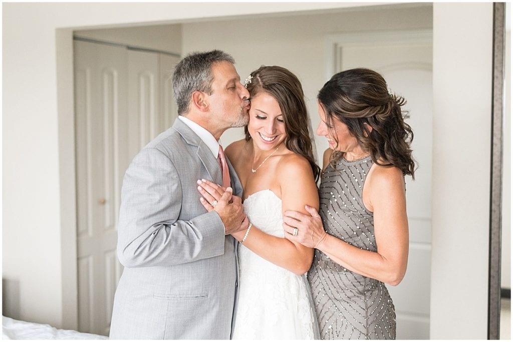 Bride with her parents before wedding at The Lighthouse Restaurant in Cedar Lake, Indiana by Victoria Rayburn Photography