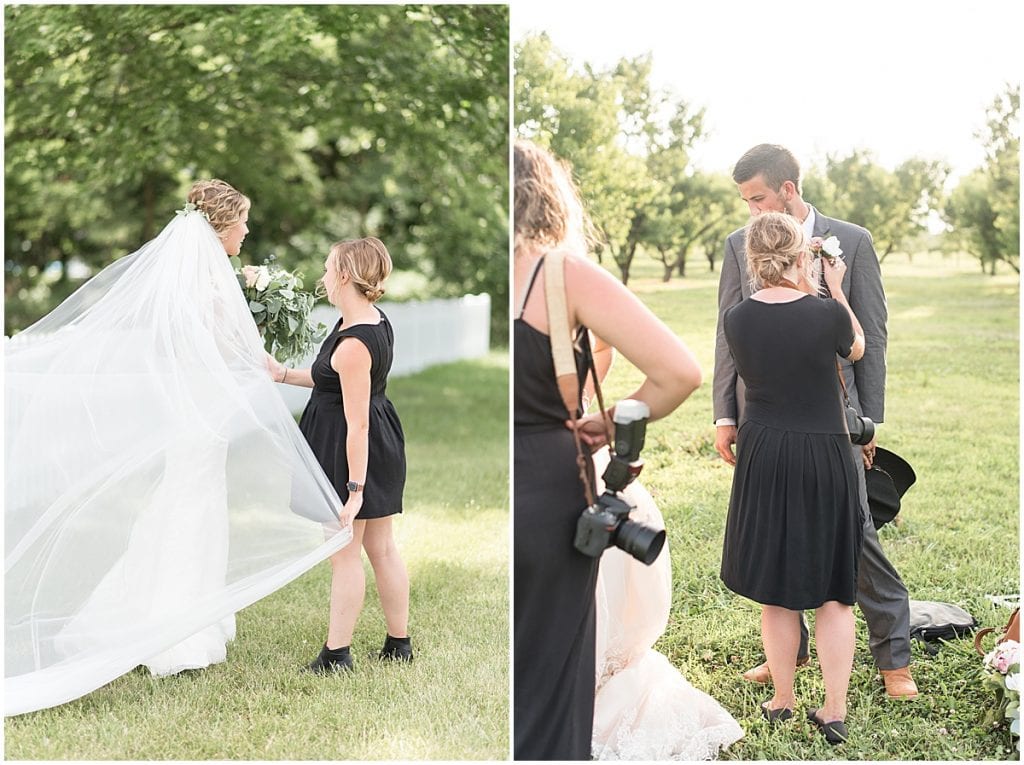 Lafayette, Indiana photographer Victoria Rayburn pinning boutonnière and fluffing veil