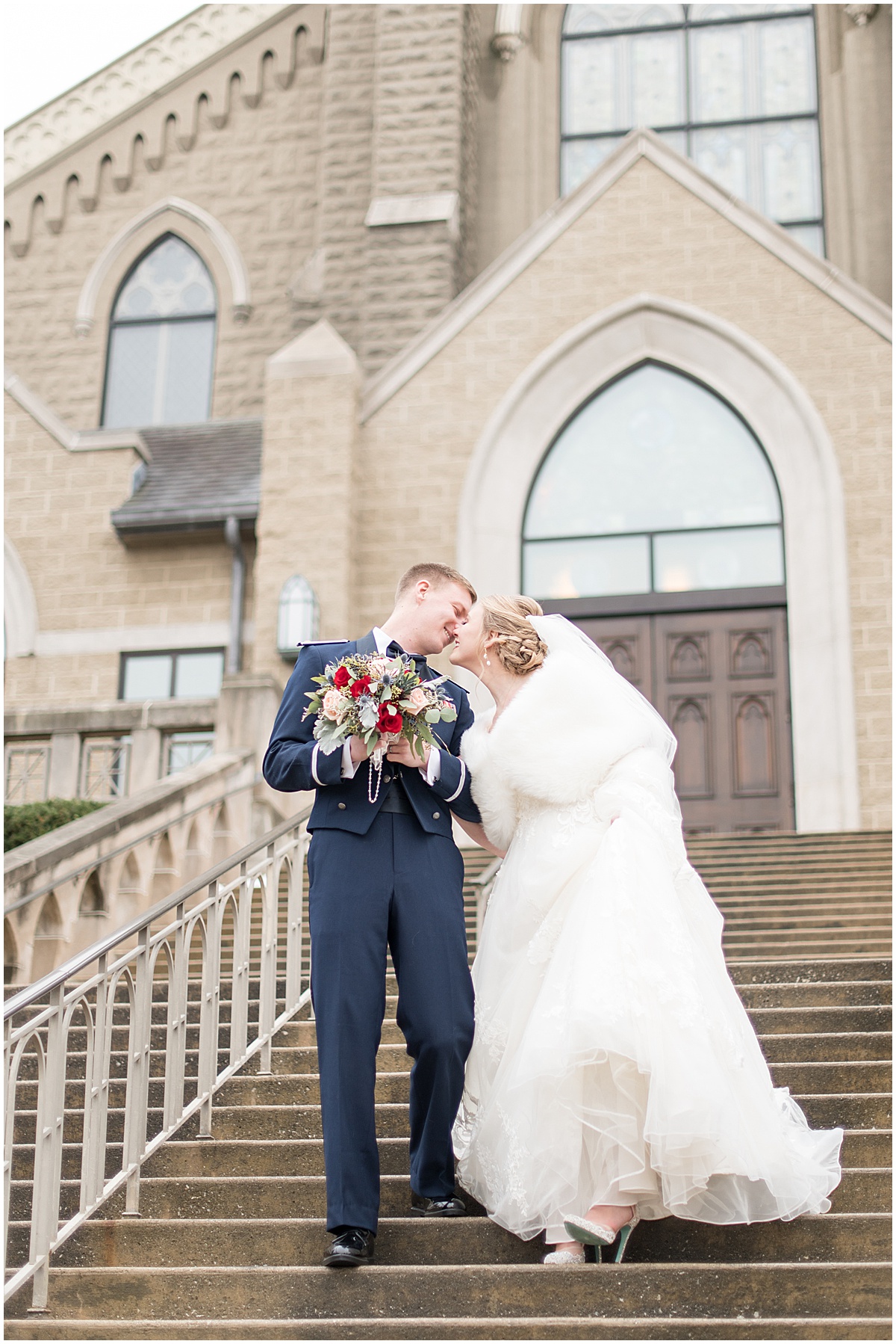 Bride and groom just married photos after ceremony at the Cathedral of Saint Mary in Lafayette, Indiana