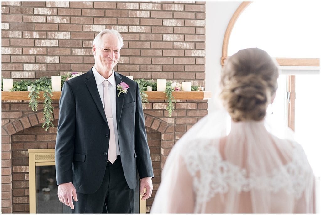 Father of the bride first look before at-home, socially distanced wedding