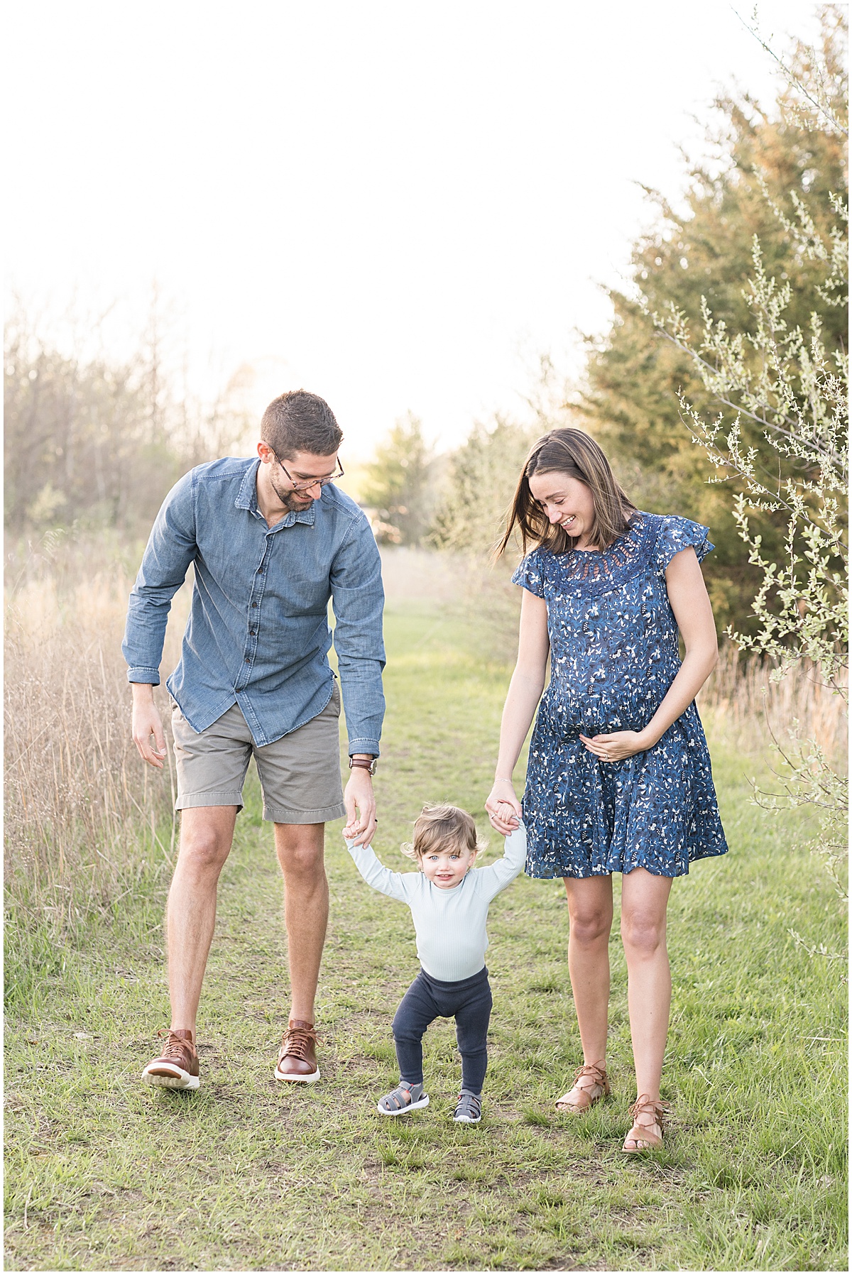 Spring maternity photos at Fairfield Lakes Park in Lafayette, Indiana with toddler