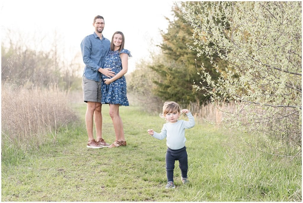 Spring maternity photos at Fairfield Lakes Park in Lafayette, Indiana with toddler
