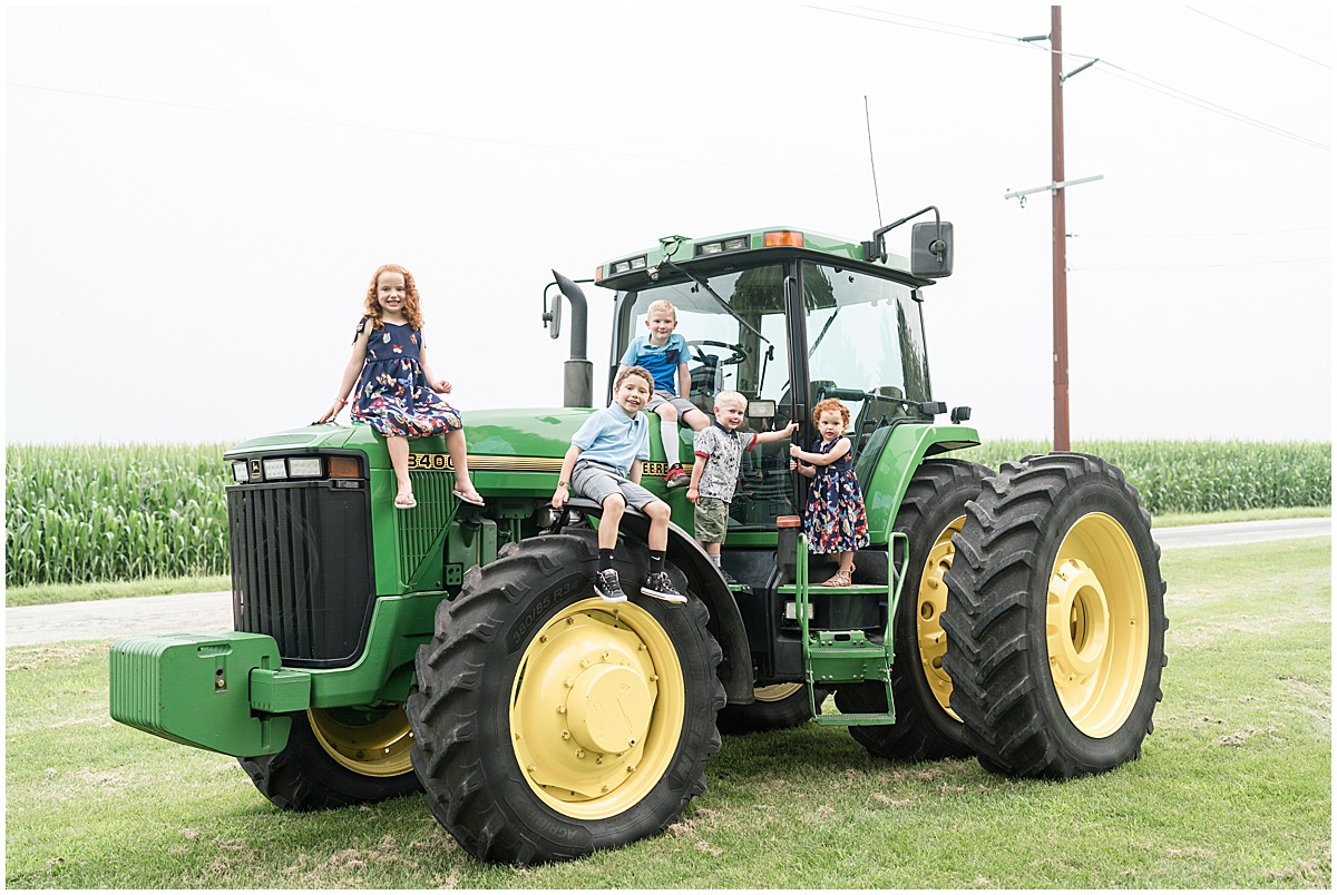 Extended family photos on the farm in Remington, Indiana with a tractor
