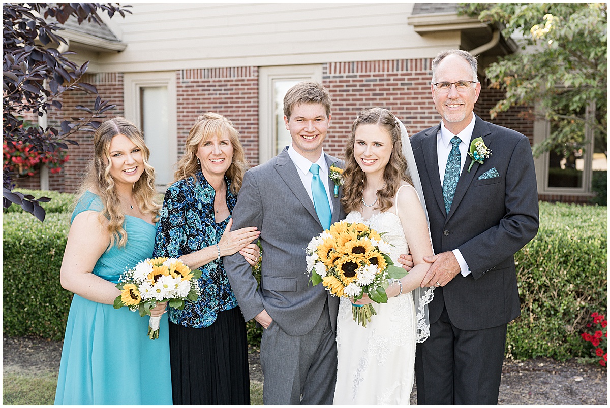 Family portraits after River Glen Country Club wedding in Fishers, Indiana