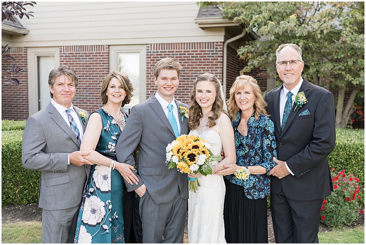 Family portraits after River Glen Country Club wedding in Fishers, Indiana