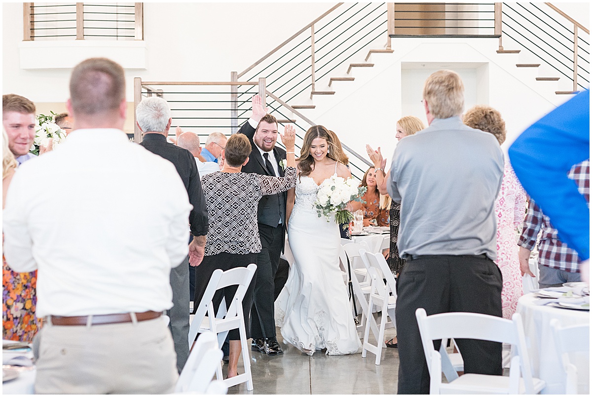 Grand entrance at New Journey Farms wedding reception in Lafayette, Indiana by Victoria Rayburn Photography