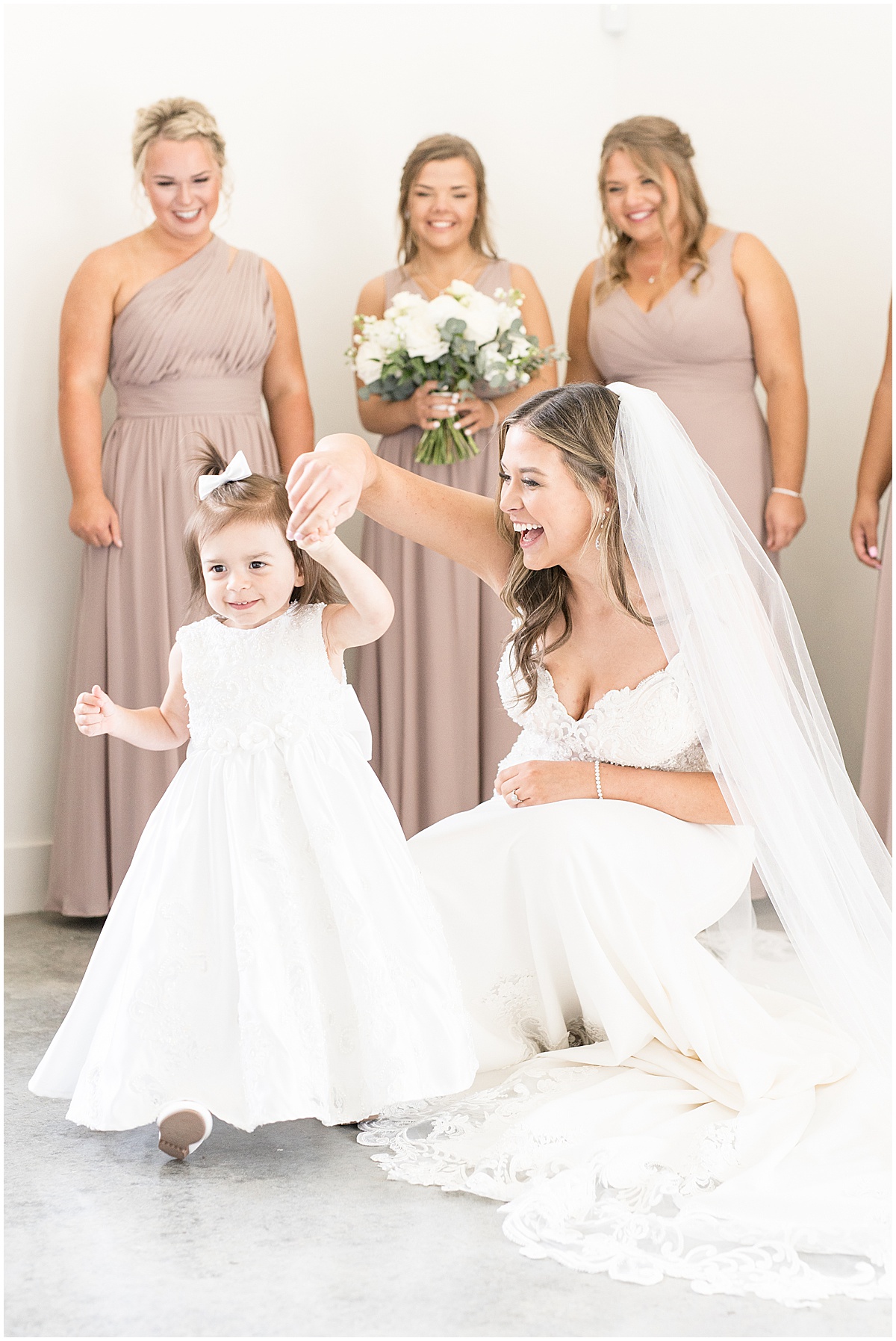 Flowergirl first look reaction at New Journey Farms wedding in Lafayette, Indiana by Victoria Rayburn Photography