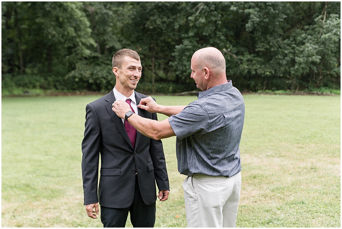 Groom getting ready for Wildcat Conservation Club wedding in Mulberry, Indiana