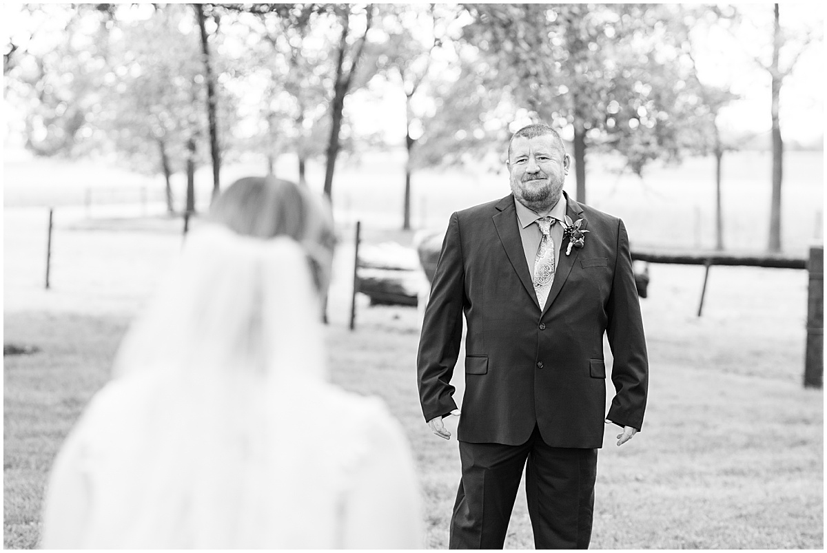 Father of bride first look at fall wedding at Vintage Oaks Banquet Barn in Delphi, Indiana