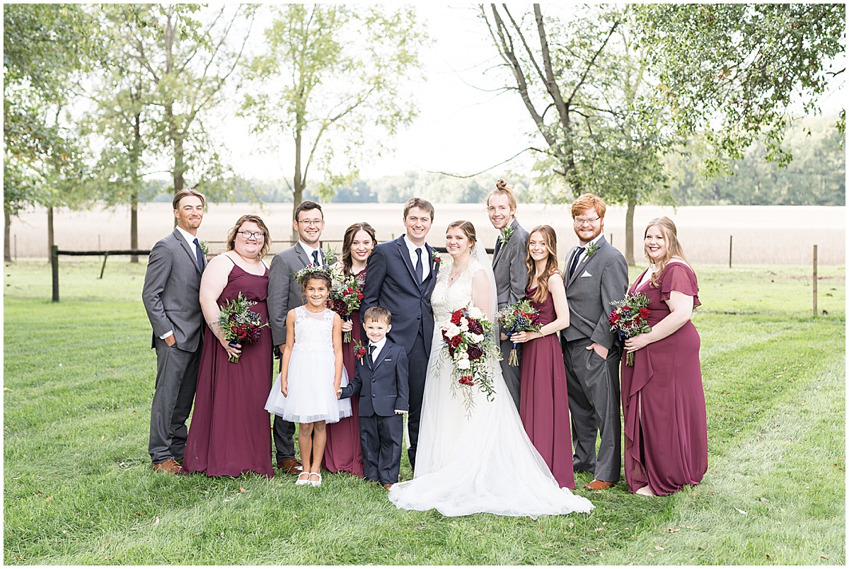 Bridal party photos at fall wedding at Vintage Oaks Banquet Barn in Delphi, Indiana