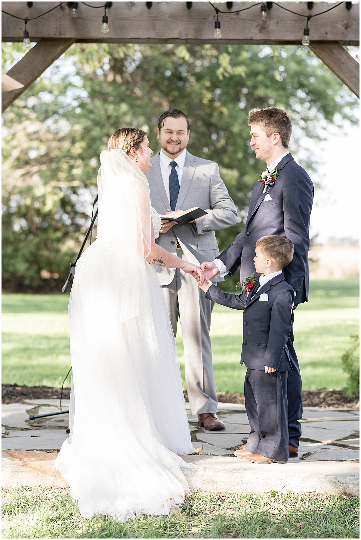 Ceremony of fall wedding at Vintage Oaks Banquet Barn in Delphi, Indiana