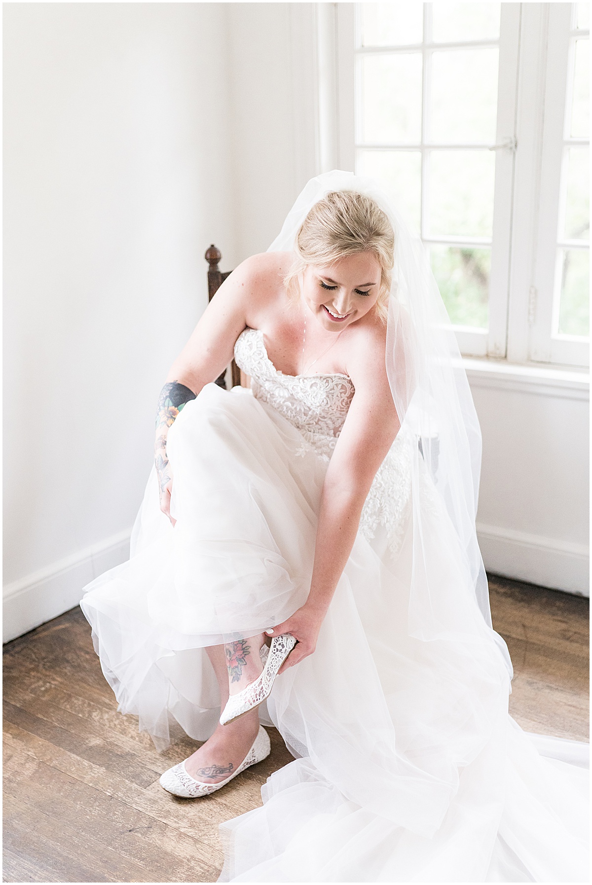 Bride getting ready for Fowler House Mansion wedding in Lafayette, Indiana by Victoria Rayburn Photography