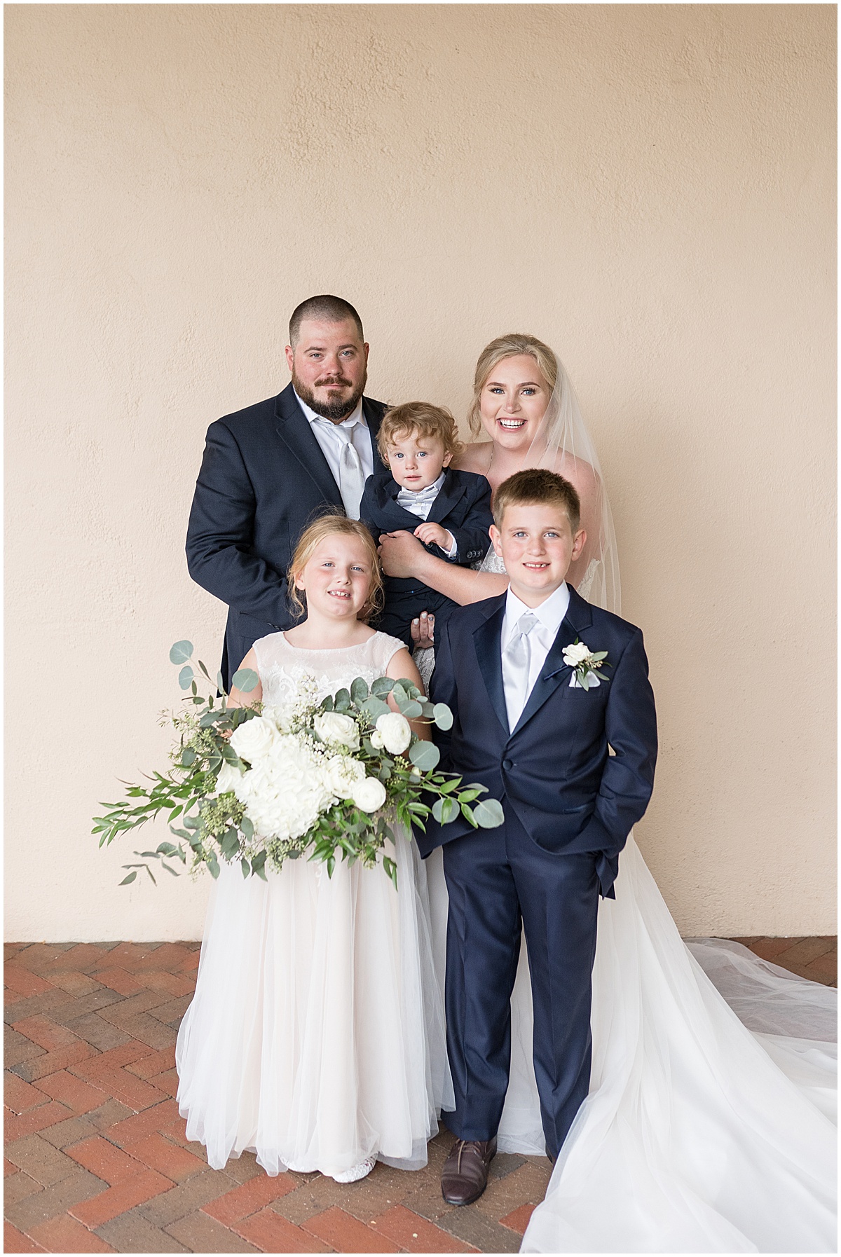 Family photos at Fowler House Mansion wedding in Lafayette, Indiana by Victoria Rayburn Photography