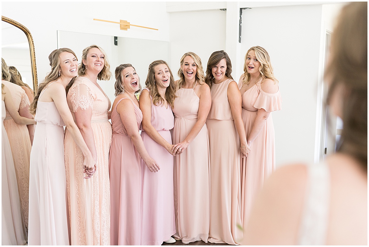 First look with bridesmaids before wedding at The Sixpence in Whitestown, Indiana by Indianapolis wedding photographer Victoria Rayburn