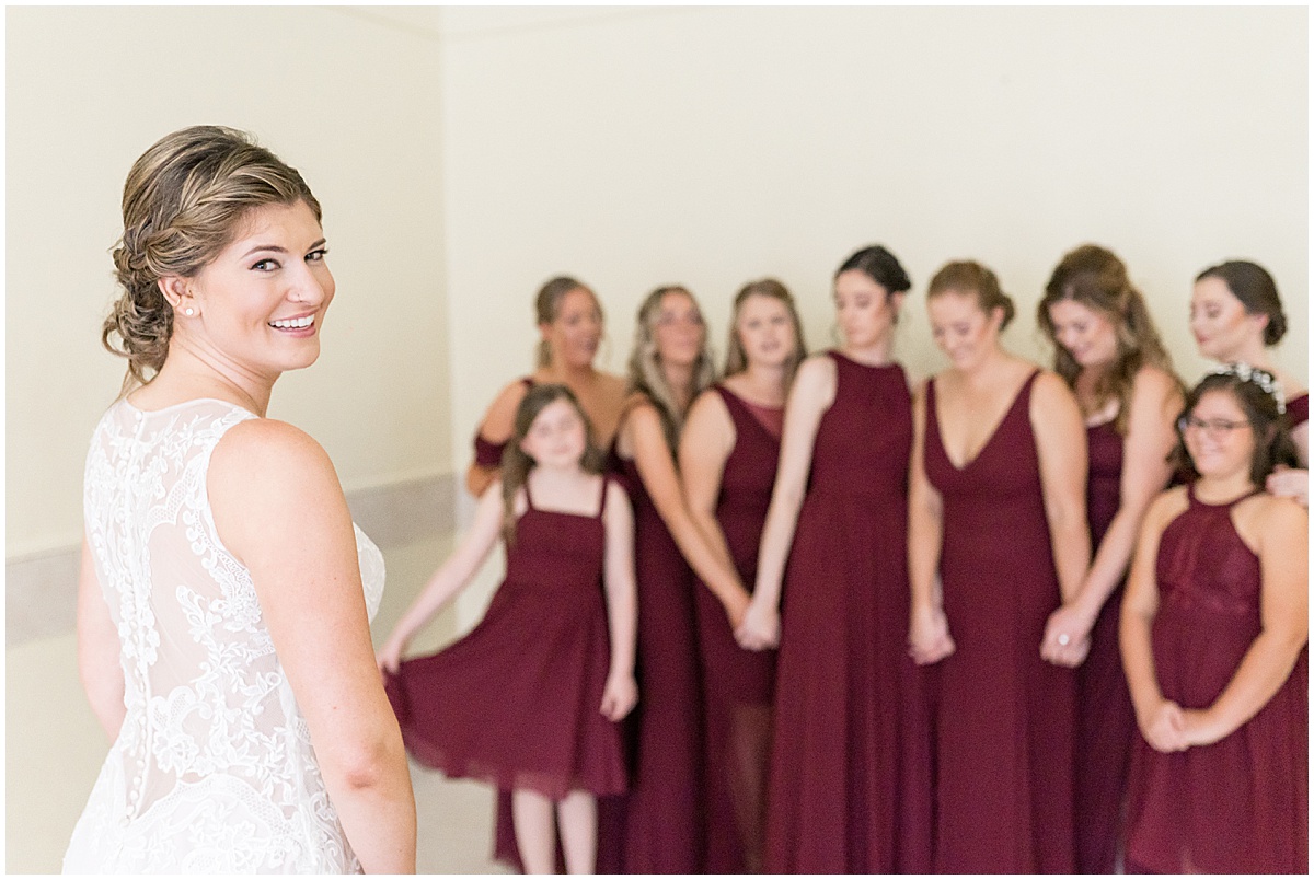 Bridesmaids reaction at Our Lady of Mercy Catholic Church in Naperville, Illinois