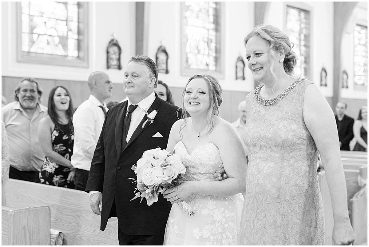 Bride walking down the aisle at County Line Orchard wedding photographed by Victoria Rayburn Photography